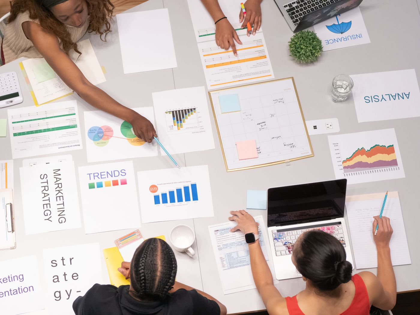 Small business owner using a laptop to manage store operations
